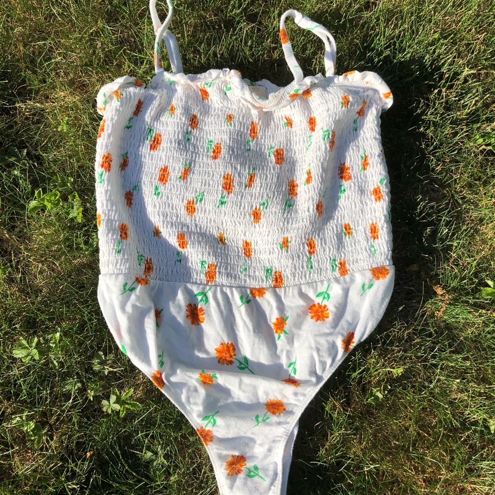 white and orange cami bodysuit